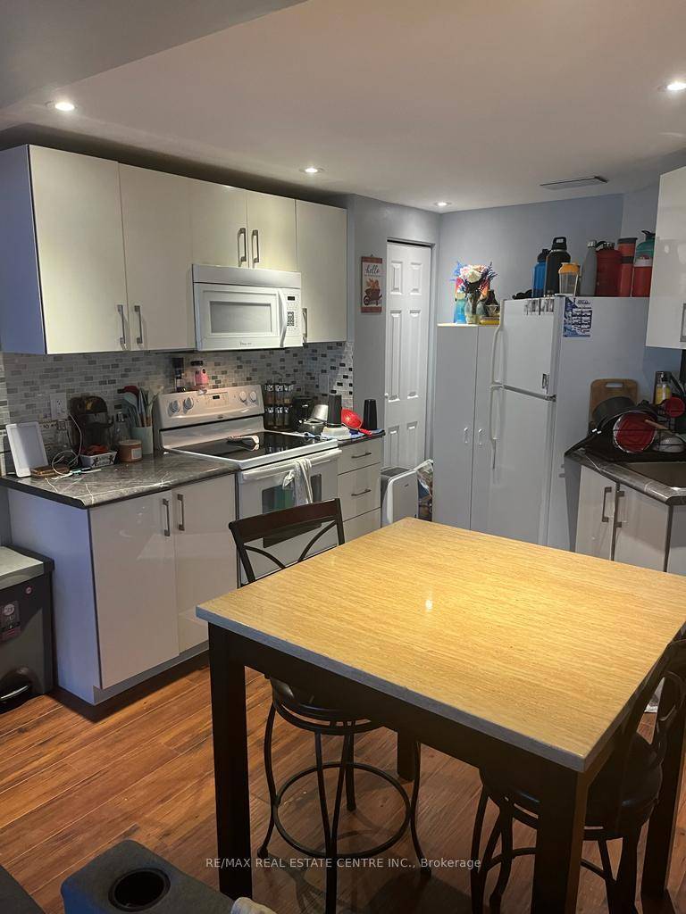 Clean, Completely Renovated, Walk Out Basement Apartment at an Excellent Location !