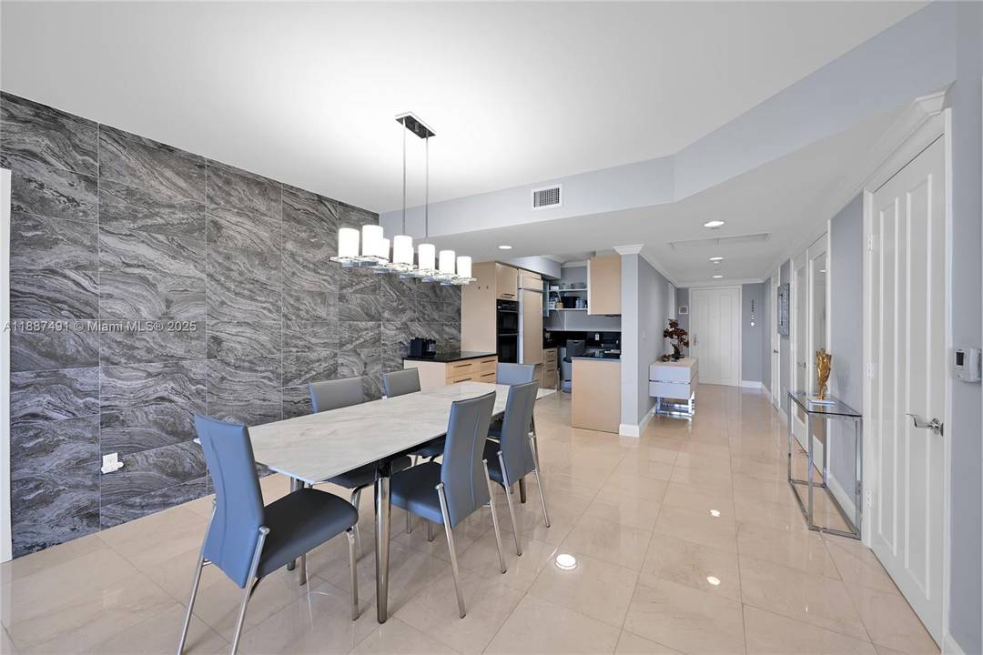 Step into elegance in this beautifully upgraded 3 bedroom, 3 bath residence with breathtaking Intracoastal views.