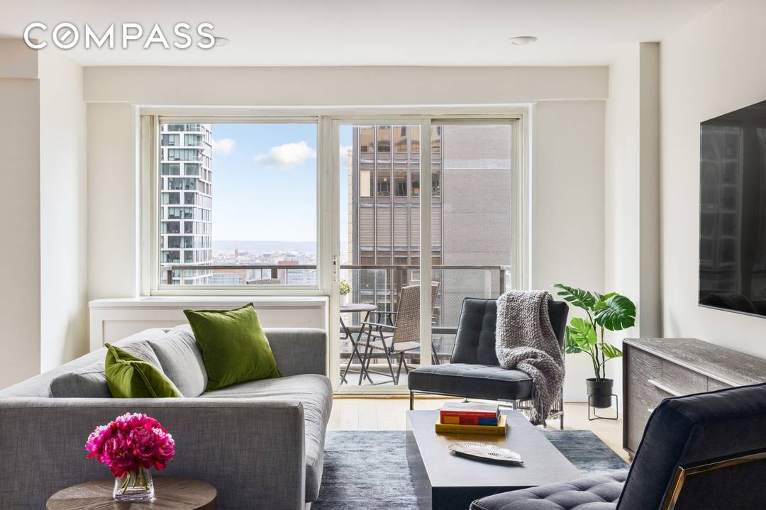 Welcome to this thoughtfully renovated, high floor 2 bedroom and 2 bathroom home in Tower 53 Condominium, a full service condominium in the heart of Midtown Manhattan.