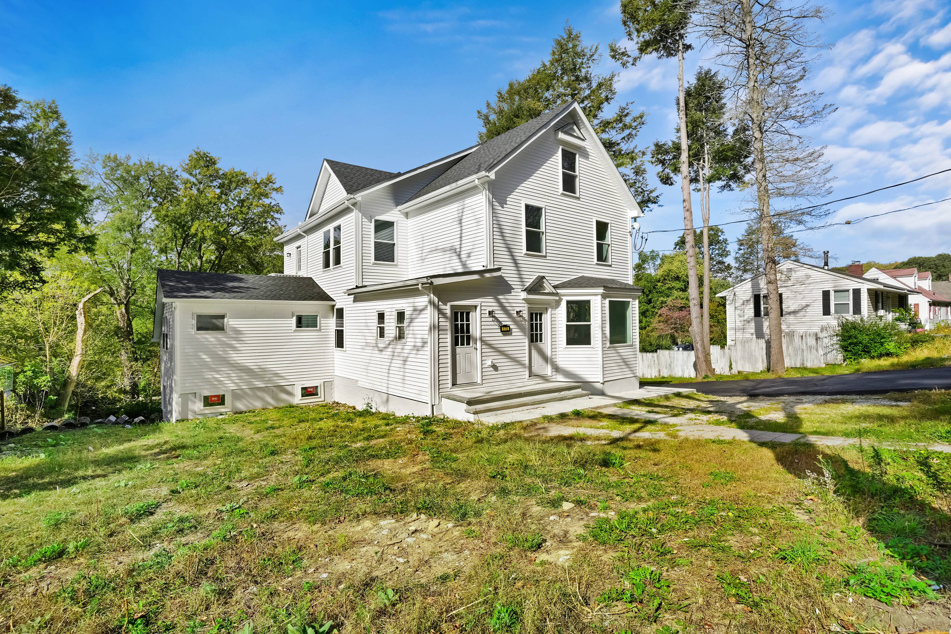 Welcome to 173 Wellsville Avenue, a fully rebuilt and beautifully remodeled two family home in the heart of New Milford, CT.