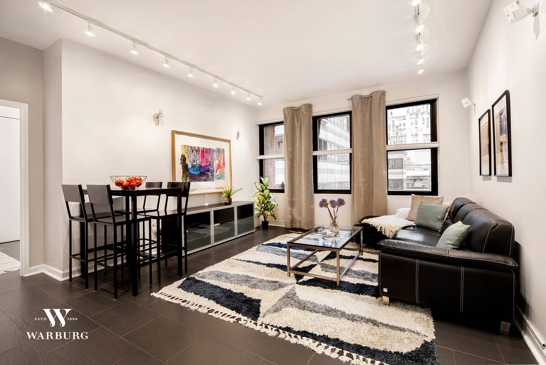 Apartment 10BC is a beautiful, loft apartment providing southern and northern exposures at the historic 56 Pine Condominium, a full service, amenity rich building.