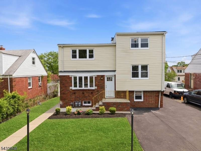 Fully renovated 2 family home in the heart of Clifton offering modern finishes and exceptional versatility !
