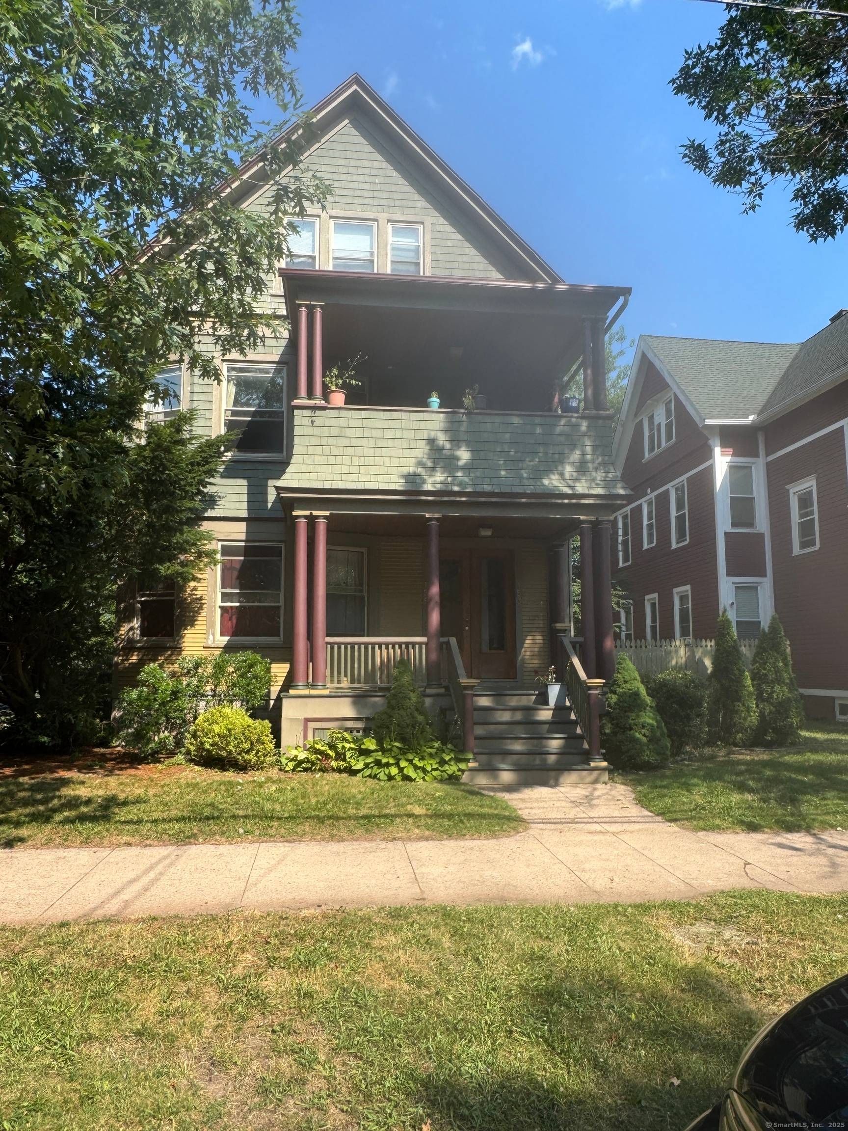 Set on a prominent corner in New Haven's desirable Edgewood neighborhood, this stately property combines timeless character with strong income potential.
