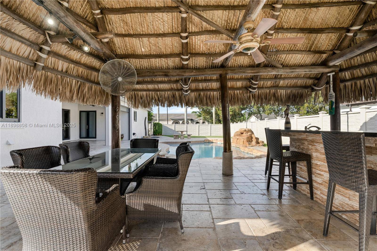 Beautiful 4 bed, 3 bath home with grand entrance, marble floors in living areas, and hardwood in bedrooms.