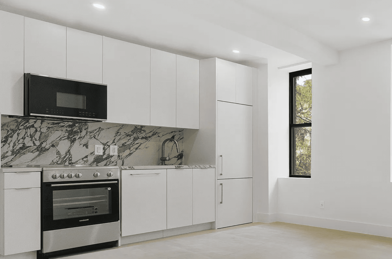 Beautifully gut renovated 2 bedroom, 1 bath residence featuring a stunning large kitchen with stainless steel appliances, wide plank Oak flooring, spacious bedrooms and in unit washer dryer.