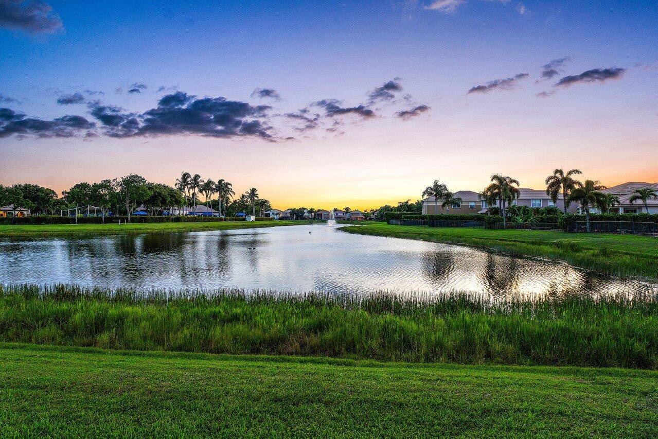 Its All About the Views on This Gorgeous Ranch Home on the Best Lake Lot in Canyon Springs !