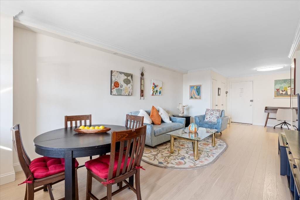 Offering wide open city and river views from living dining room and bedroom, this high floor, completely renovated, sun filled gorgeous one bedroom home with a private 12 balcony resides ...