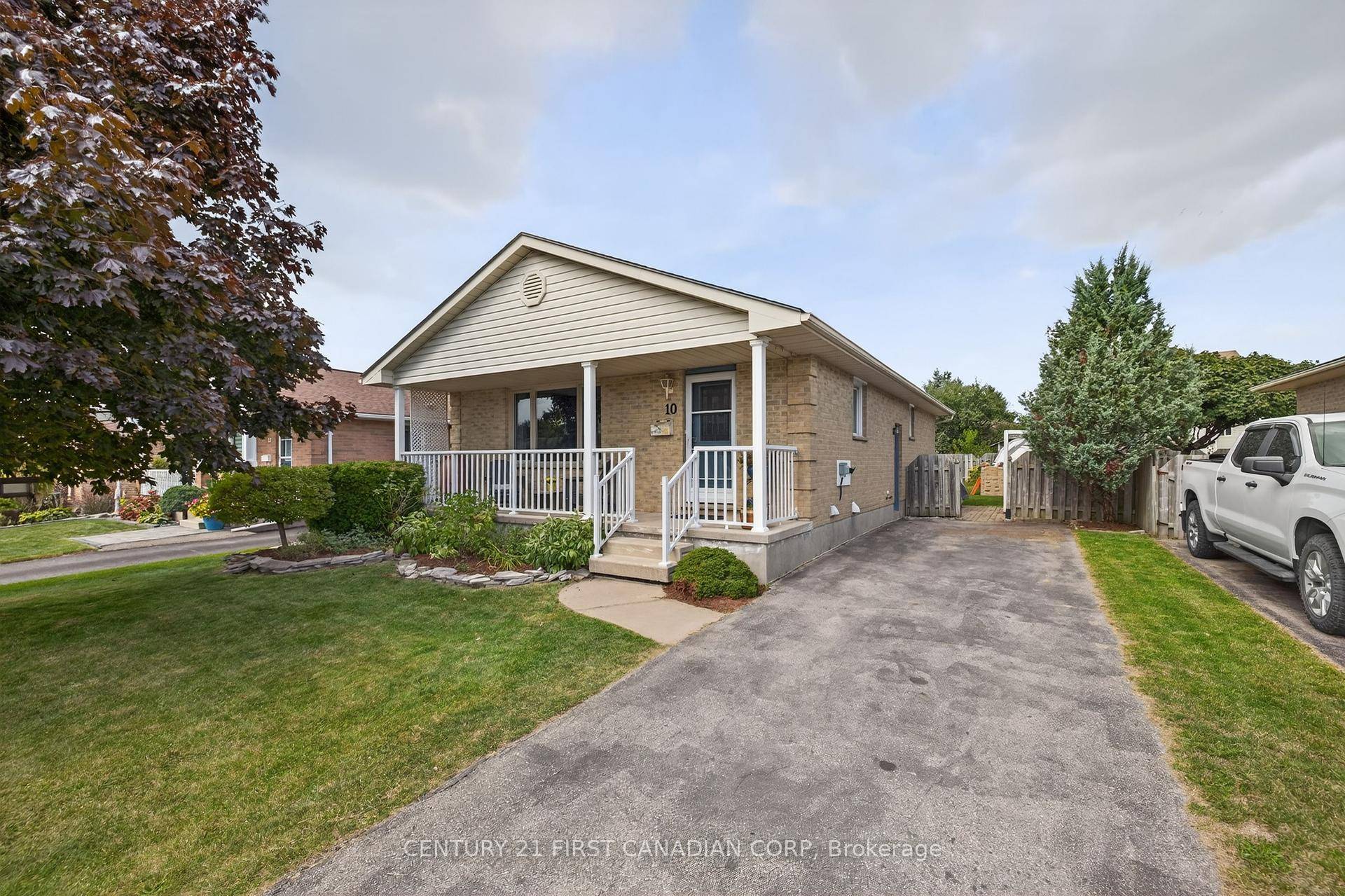 Adorable bungalow with a cozy covered front porch.