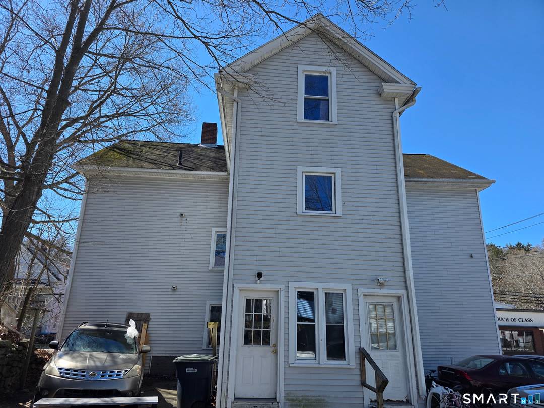 4 UNITS PLUS A 3 FAMILY ALL ON ONE PROPERTY, PLENTY OF OFF STREET PARKING, FULLY RENTED AND SOME LONG TERM TENANTS IN PLACE.