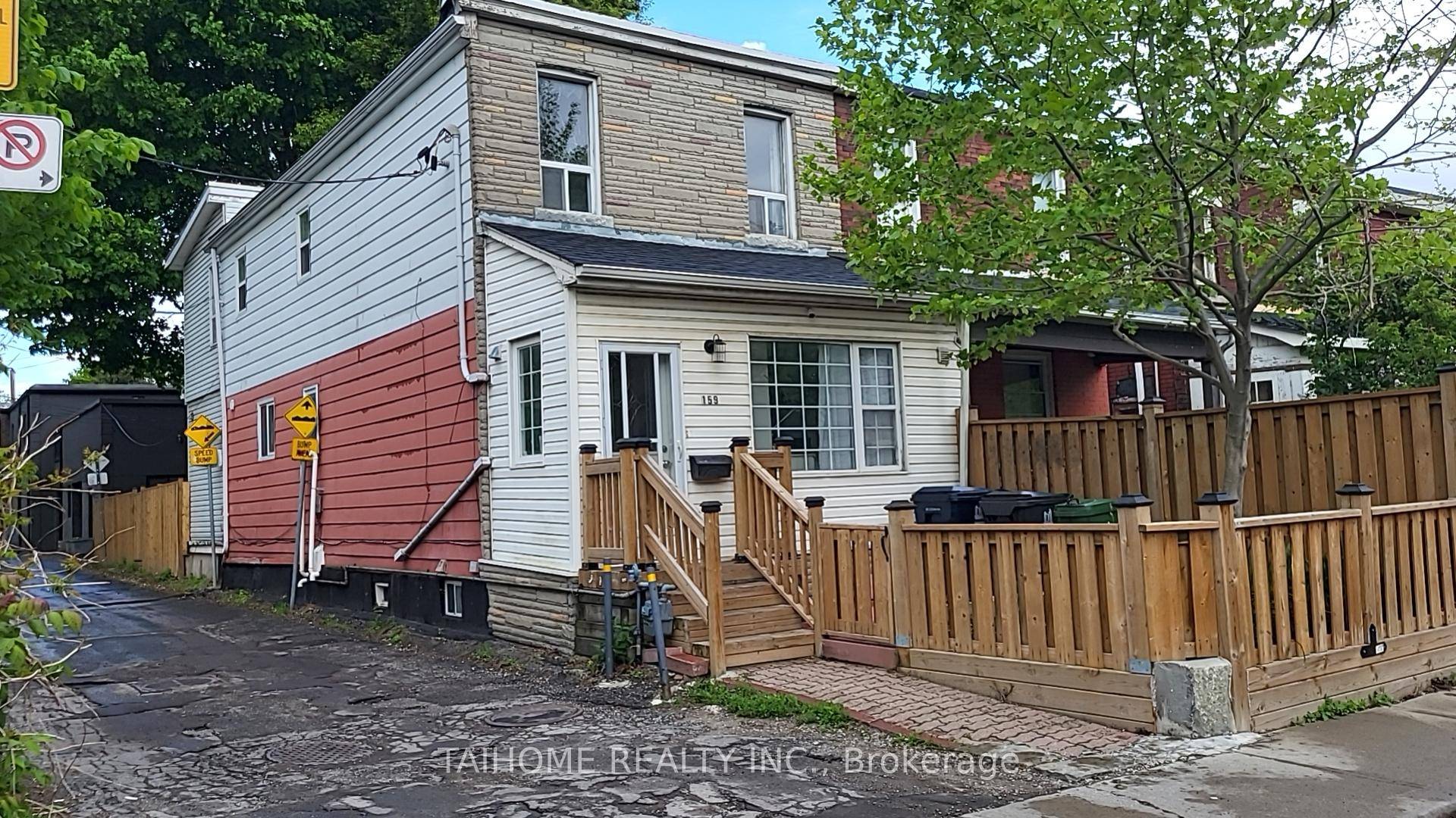A Semi Detached House Is On A Quiet, No Exit Street, East of Downtown !
