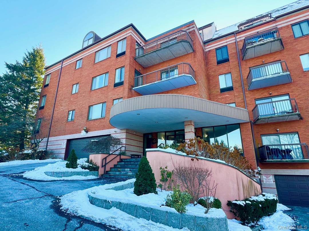 Rare Opportunity ! Discover the unique charm of this first floor unit at The Enclave, offering a blend of luxury condo living and the privacy of a townhouse.