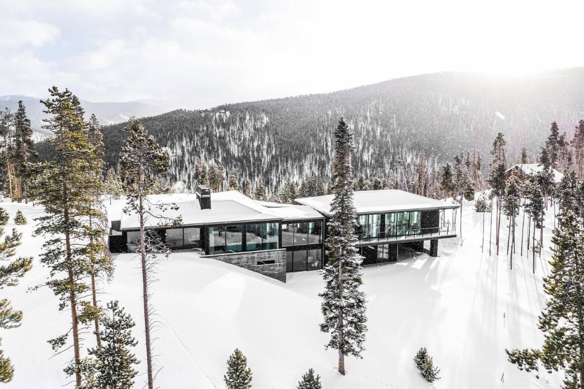 Perched high above beautiful Breckenridge, across the Tenmile Range, walls of window flood natural light throughout this European masterpiece.