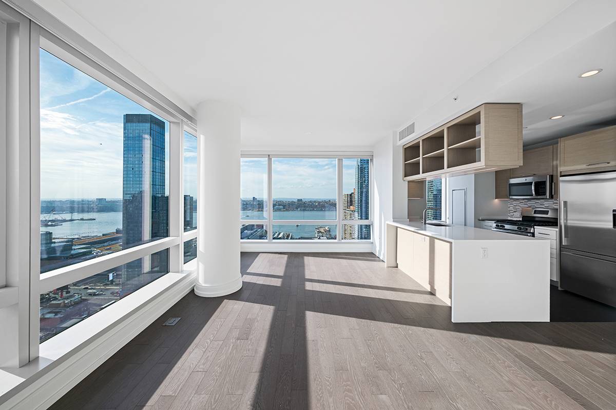 With sweeping views of the city from sunrise to sunset 555TEN towers over the new West Side.