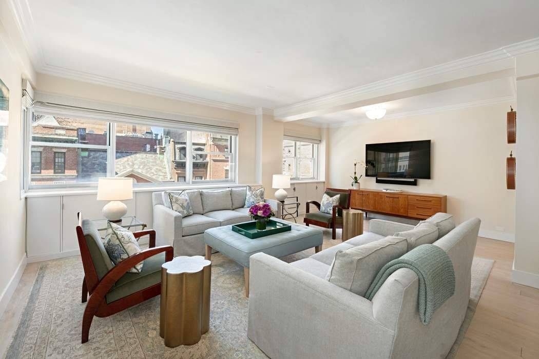 Fabulous two Bedroom two Bath condominium in prime Upper East Side location, one block from Central Park.