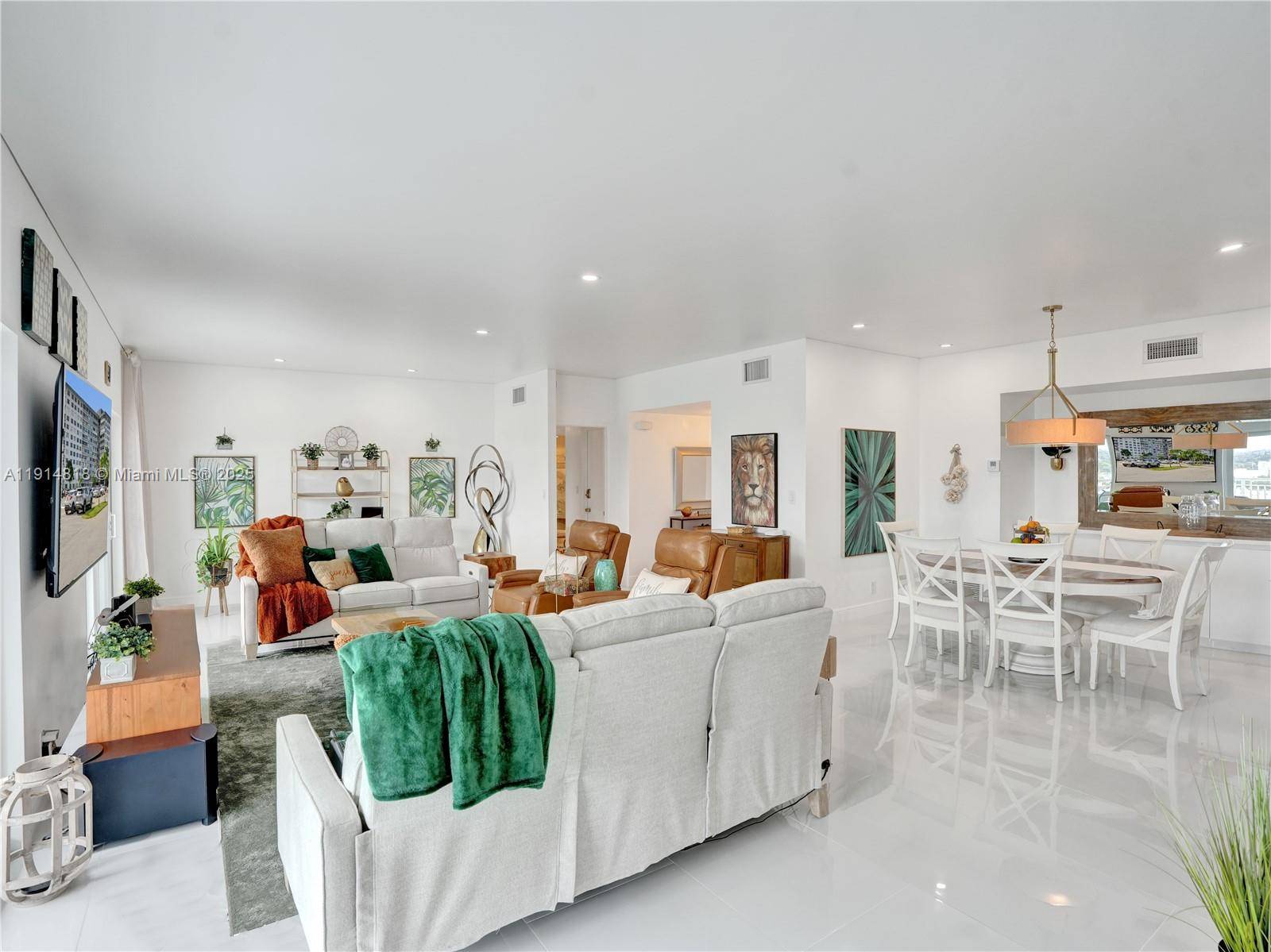 Completely Remodeled into a LUXURY PENTHOUSE CONDO with a MILLION DOLLAR VIEW out the East to the Hollywood beaches, to the south at the Miami Skyline and the west to ...