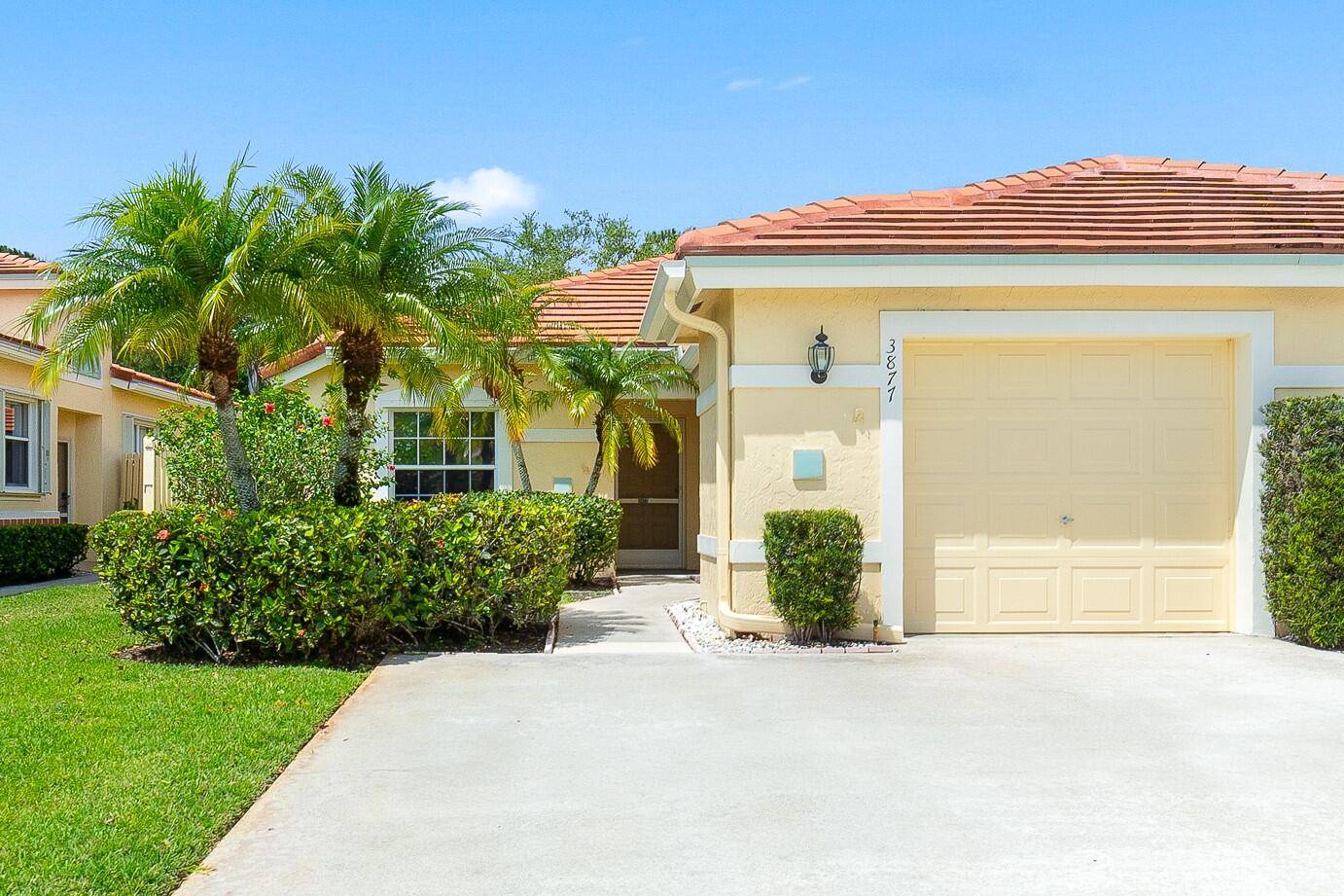 Welcome to your dream lifestyle at this beautifully updated villa nestled within the serene, gated 55 community of Whispering Sound in Palm City, Florida.