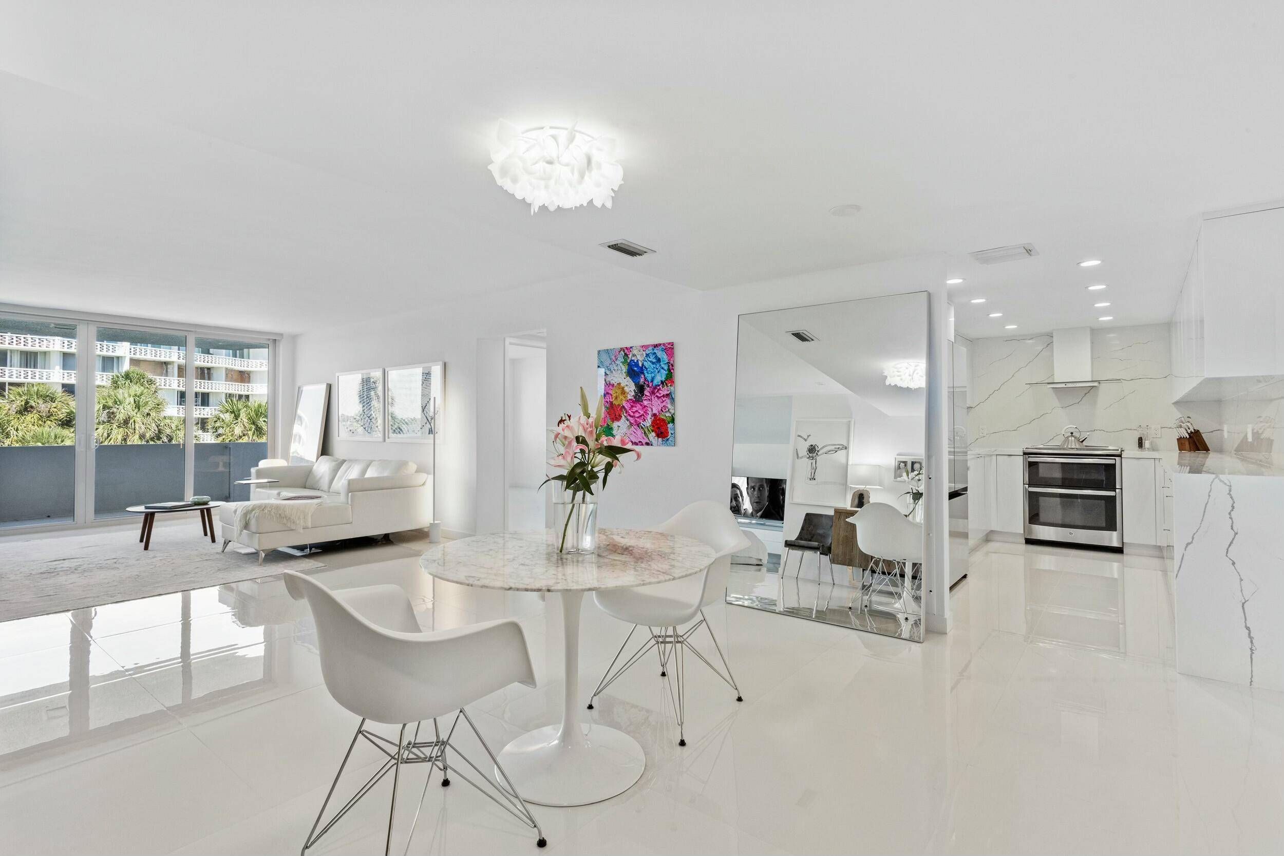 Stunning water views from this beautifully renovated Palm Beach Chic Paradise with private balcony !