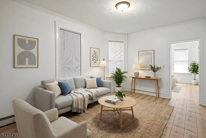 On the Border of Clifton, this Renovated Two Family home is perfect for Investors or First Time Owner Occupants.