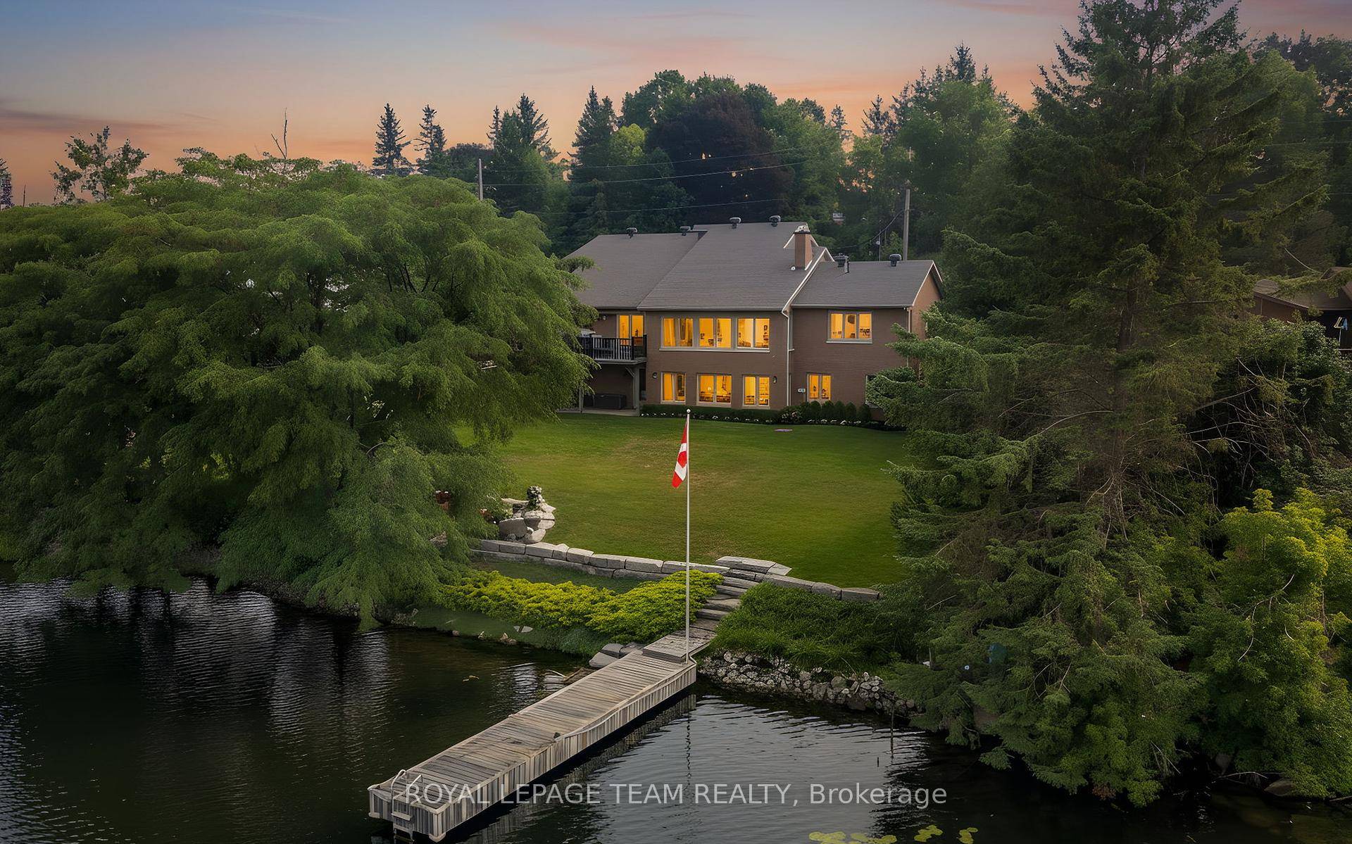 This Manotick waterfront home offers impressive features and breathtaking sunset river views from the moment you step inside.