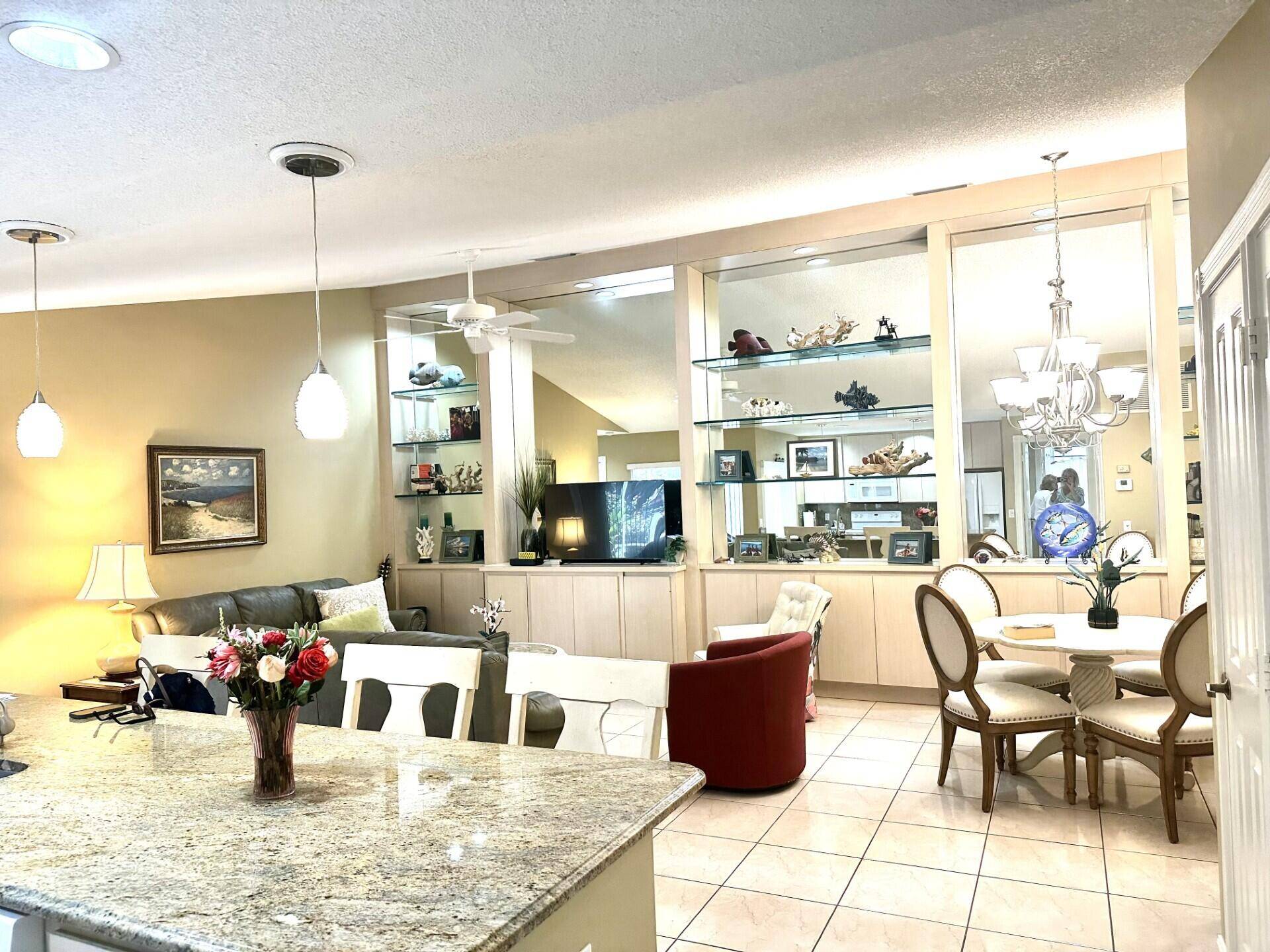 Great opportunity in this centrally located townhome with oversized screened patio and garden views.