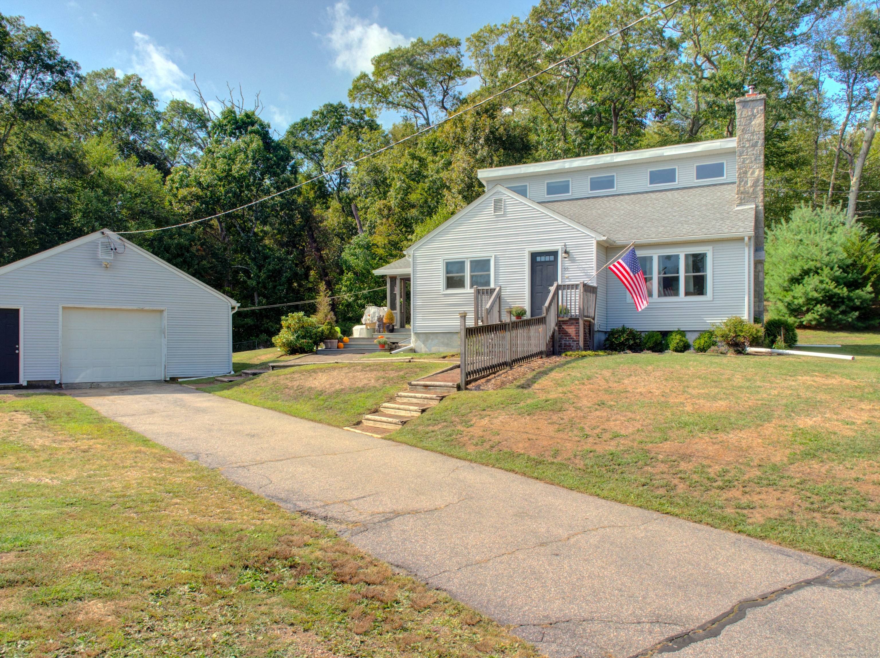 Step into this beautifully updated Contemporary Cape Cod, where timeless charm meets modern convenience.