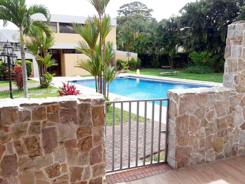 In the exclusive area of Escazú, San José, Costa Rica, this townhouse within the prestigious Condominio Venehorizonte is a true gem.