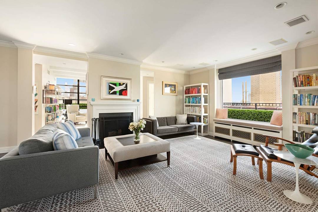 Perfectly situated atop a boutique prewar cooperative just moments from Central Park, this delightful full floor penthouse residence is a Carnegie Hill gem.