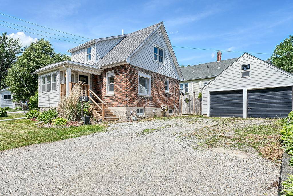 Your future home awaits in this spacious 4 2 bedroom gem, perfectly located on Woodstock's desirable South side.