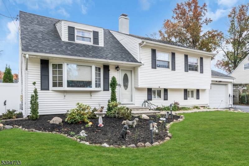 Immerse yourself in the comfort of this charming split level property, complete with a heated indoor inground pool.