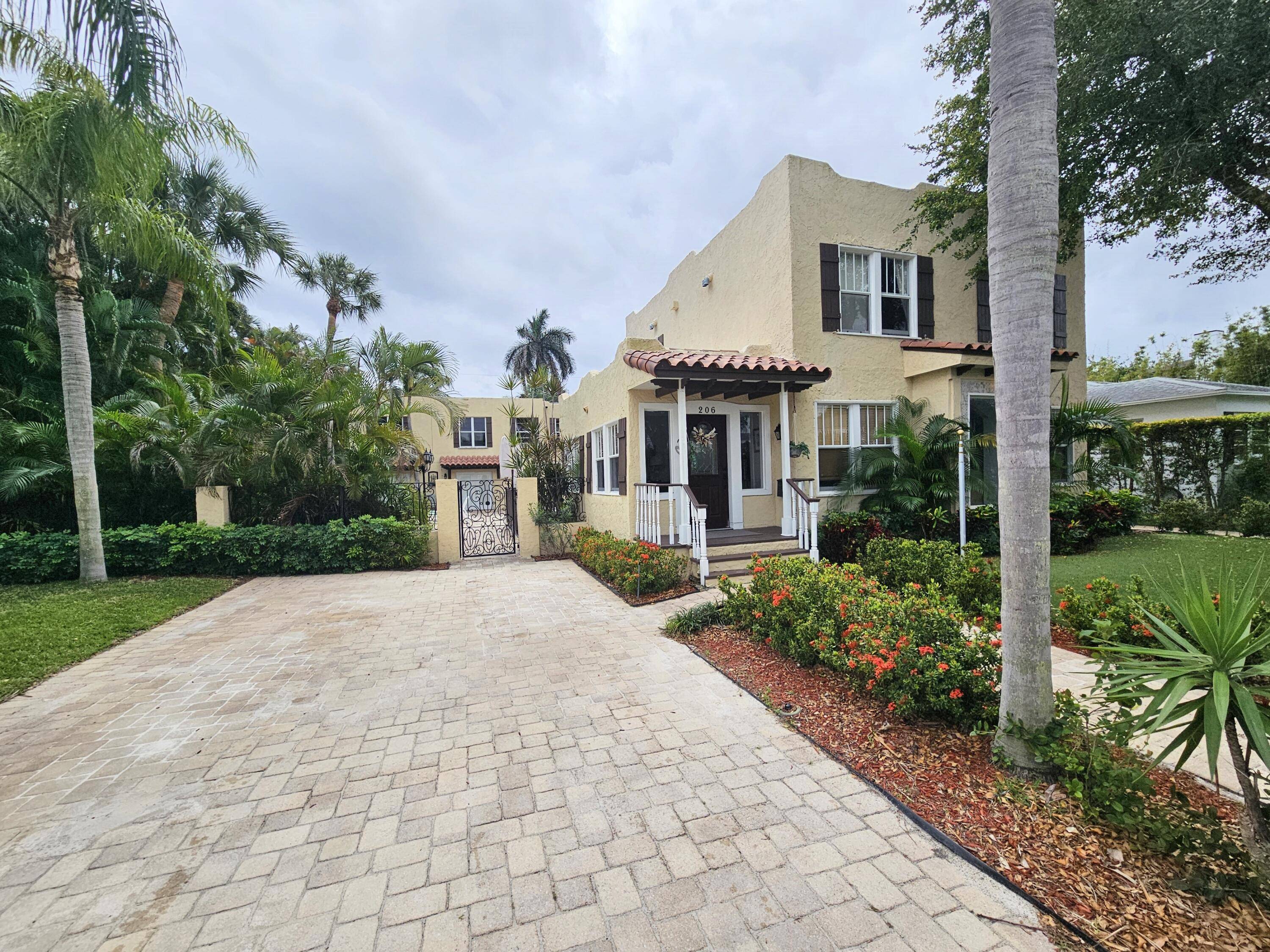 Steps from the Intracoastal, this 1925 estate in Southland Park blends historic charm with modern luxury.