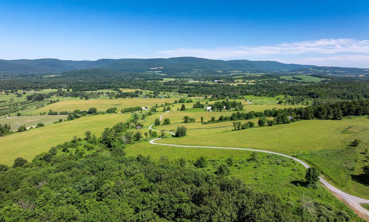 Nestled on a serene 61. 54 acre expanse in the heart of Copake, NY, this extraordinary property offers a rare opportunity to own a premier building site atop a private ...