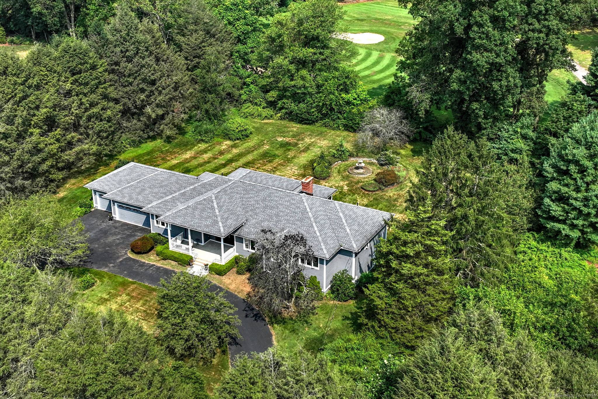 MEDITERRANEAN VILLA STYLE RANCH NESTLED ON QUIET CUL DE SAC THAT BORDERS ON THE BEAUTIFUL TRADITIONS PUBLIC GOLF CLUB AT OAK LANE.