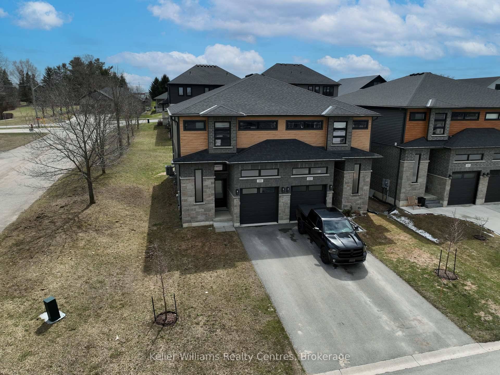 This newer but spacious 3 bedroom, 3 bathroom semi features a modern stone and brick exterior and is ideally close to all amenities.