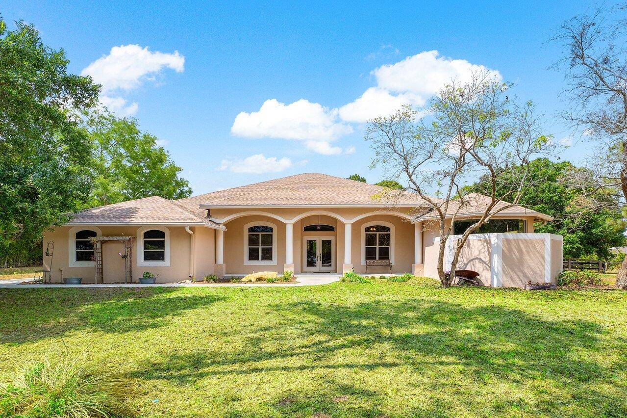 If your looking for an amazing acreage estate property this custom home is a must see !