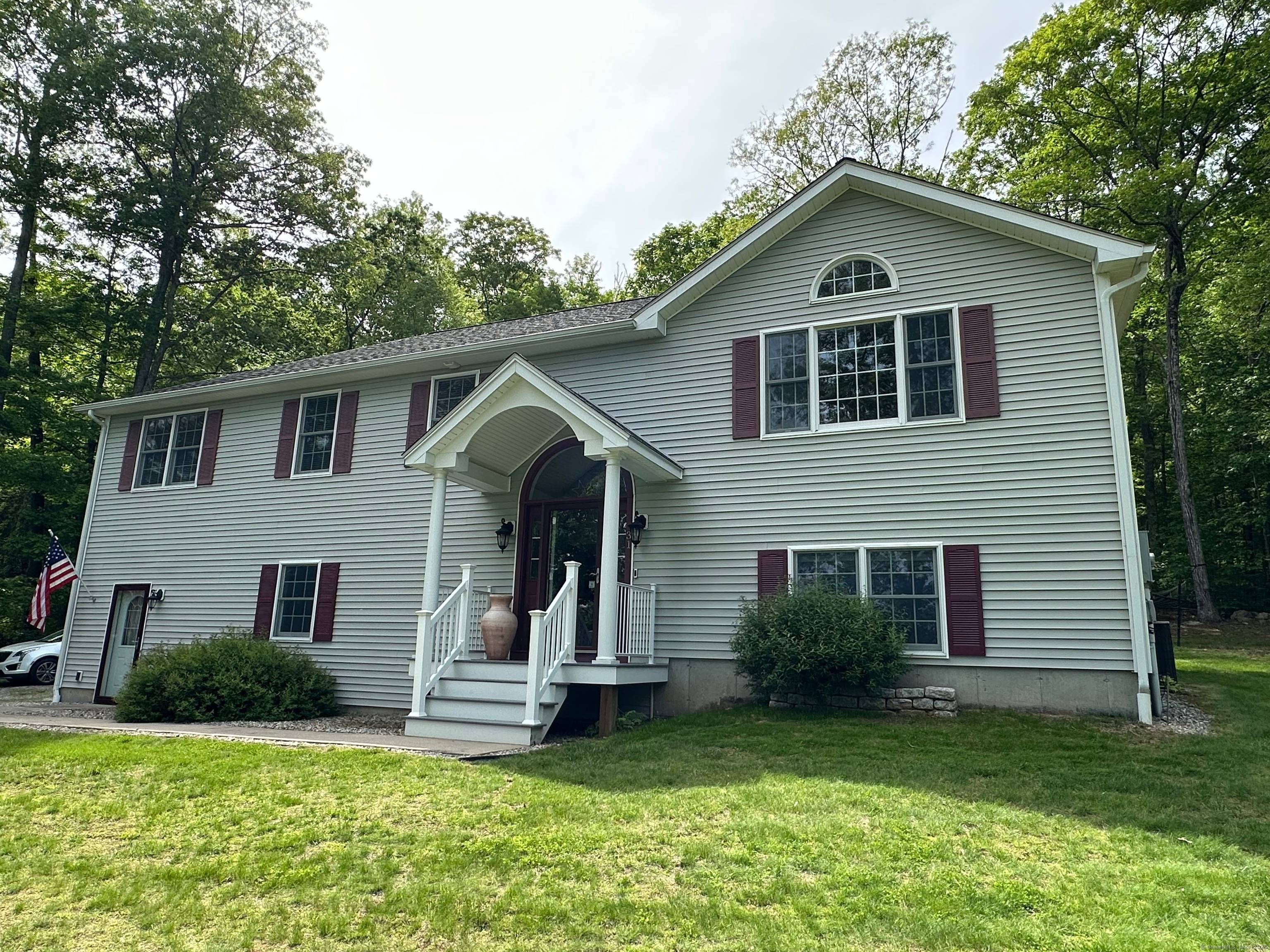 This is the one to see ! Welcome to this expansive and meticulously maintained raised ranch in the heart of Brooklyn, CT.