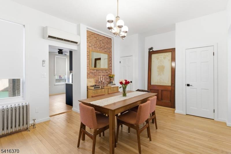 STUNNING. Completely renovated, all brick single family home with potential to be converted into a two family for rental income.