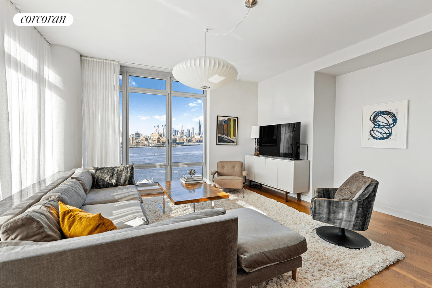 Iconic Midtown and Williamsburg Bridge Views from this expansive 1, 376 SF, sun filled corner, 2 bedroom 2 bathroom home with home office and extra large balcony at 2 Northside ...