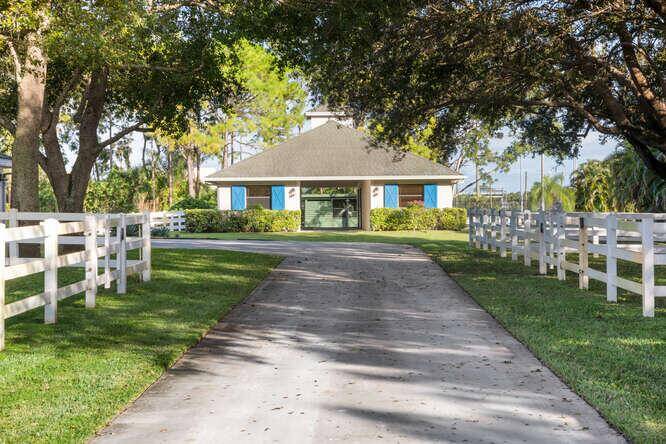 Beautiful property with two barns, 6 stalls total, sand ring with GREAT footing !