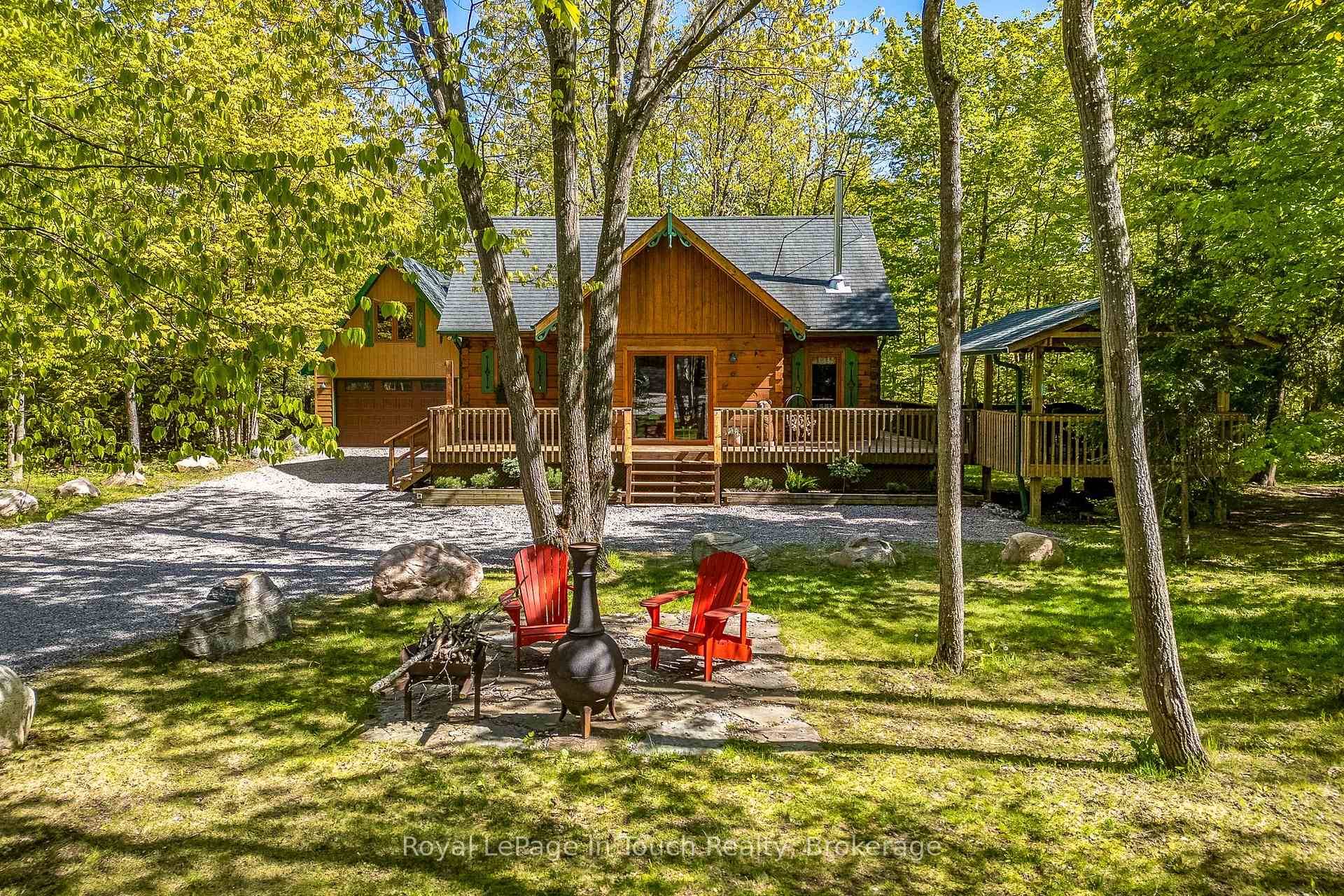 Tucked into the sought after Sand Castle Estates community, this custom built white pine log home 2008 offers year round comfort amp ; timeless cottage charm, backing directly onto one ...