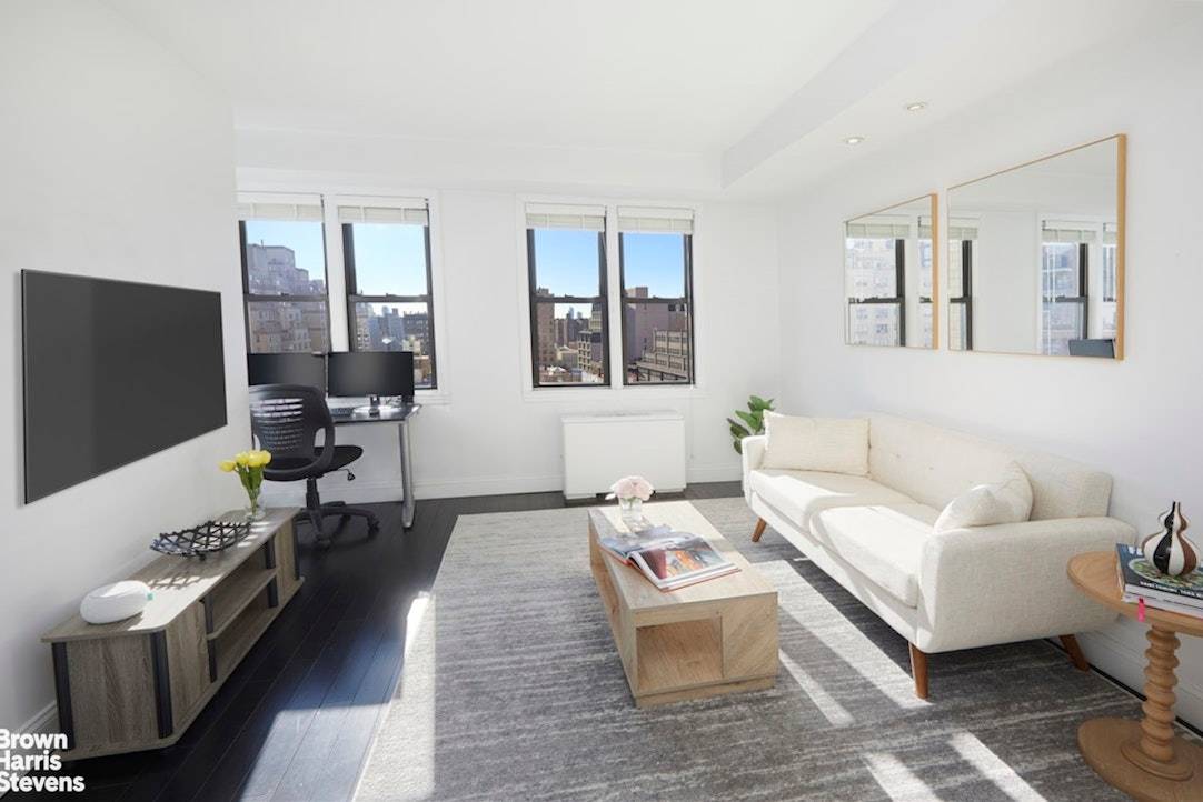 LOW MAINTENANCE ! Step into this beautifully renovated, high floor convertible one bedroom, where abundant natural light and open city views create an inviting, contemporary feel.