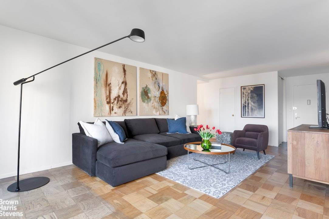 Step into a sun drenched sanctuary at this generous two bedroom, two bathroom co op on a prime corner of West End Avenue.