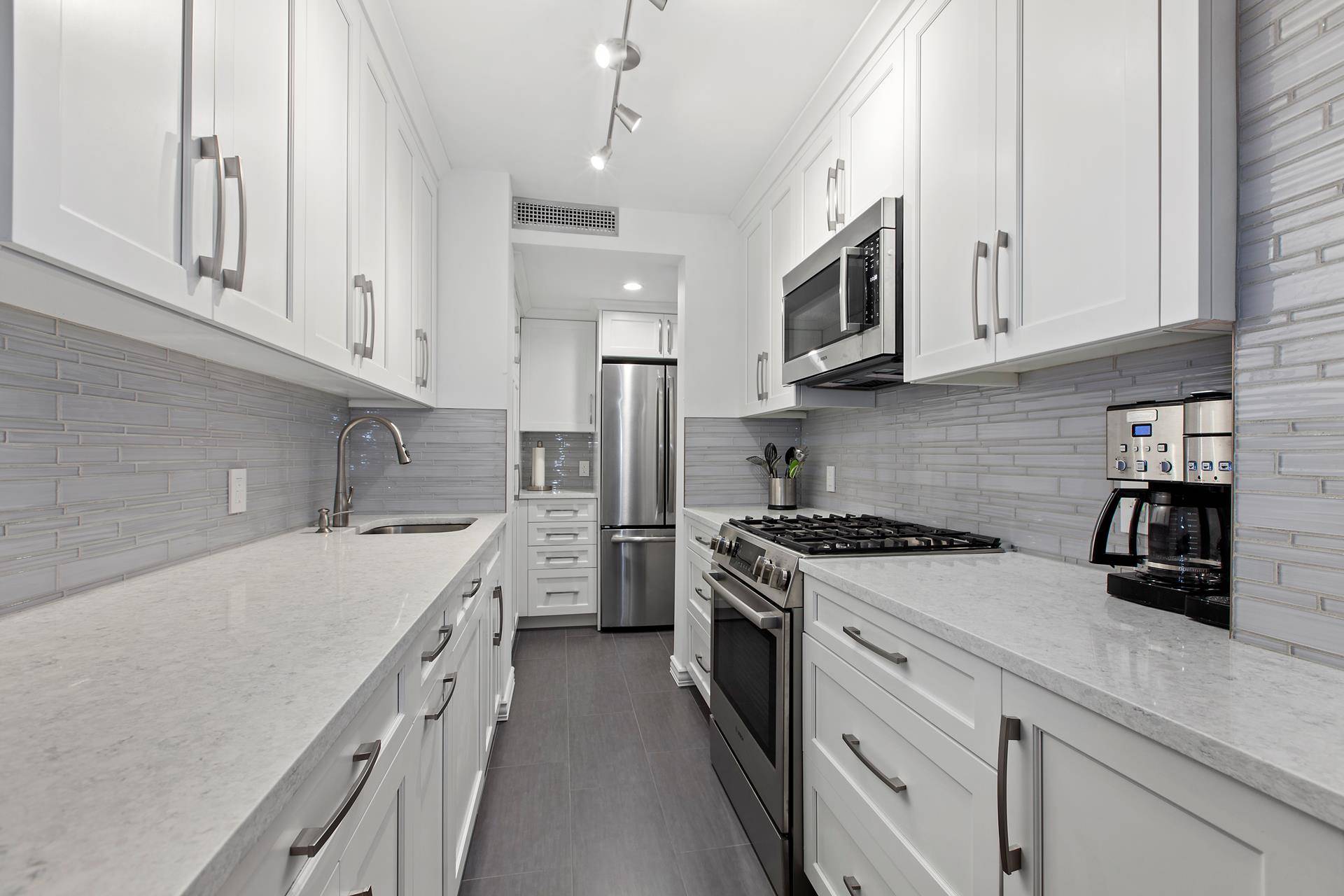 New to the market ! Move in ready, newly renovated, spacious 2 bedroom, 2 baths with plenty of closet space, a custom designed kitchen, and a sun drenched enclosed terrace ...