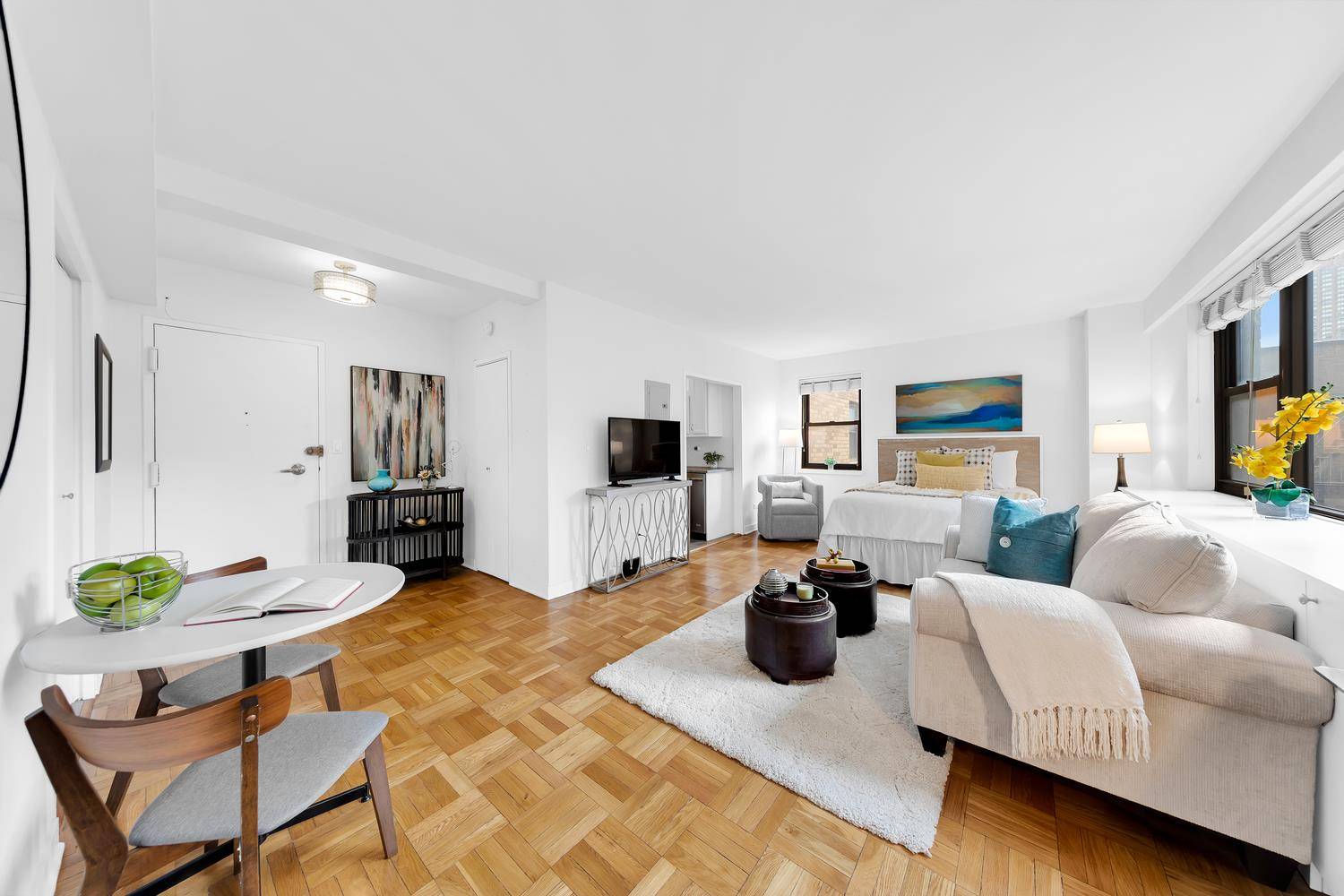 Welcome to this serene, sunlit corner studio in the heart of the Upper East Side.