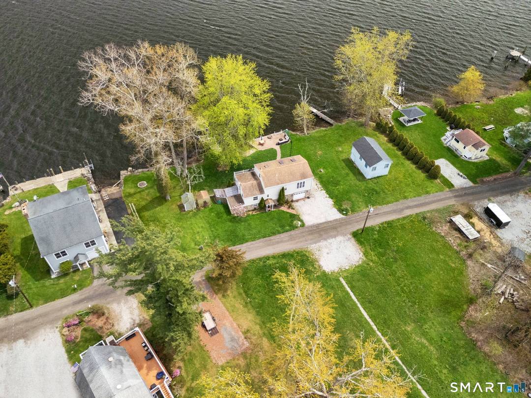 Extremely rare opportunity to own a stunning waterfront property set on over an acre along the Connecticut River, offering the perfect blend of privacy, recreation, and lifestyle ; this 2 ...