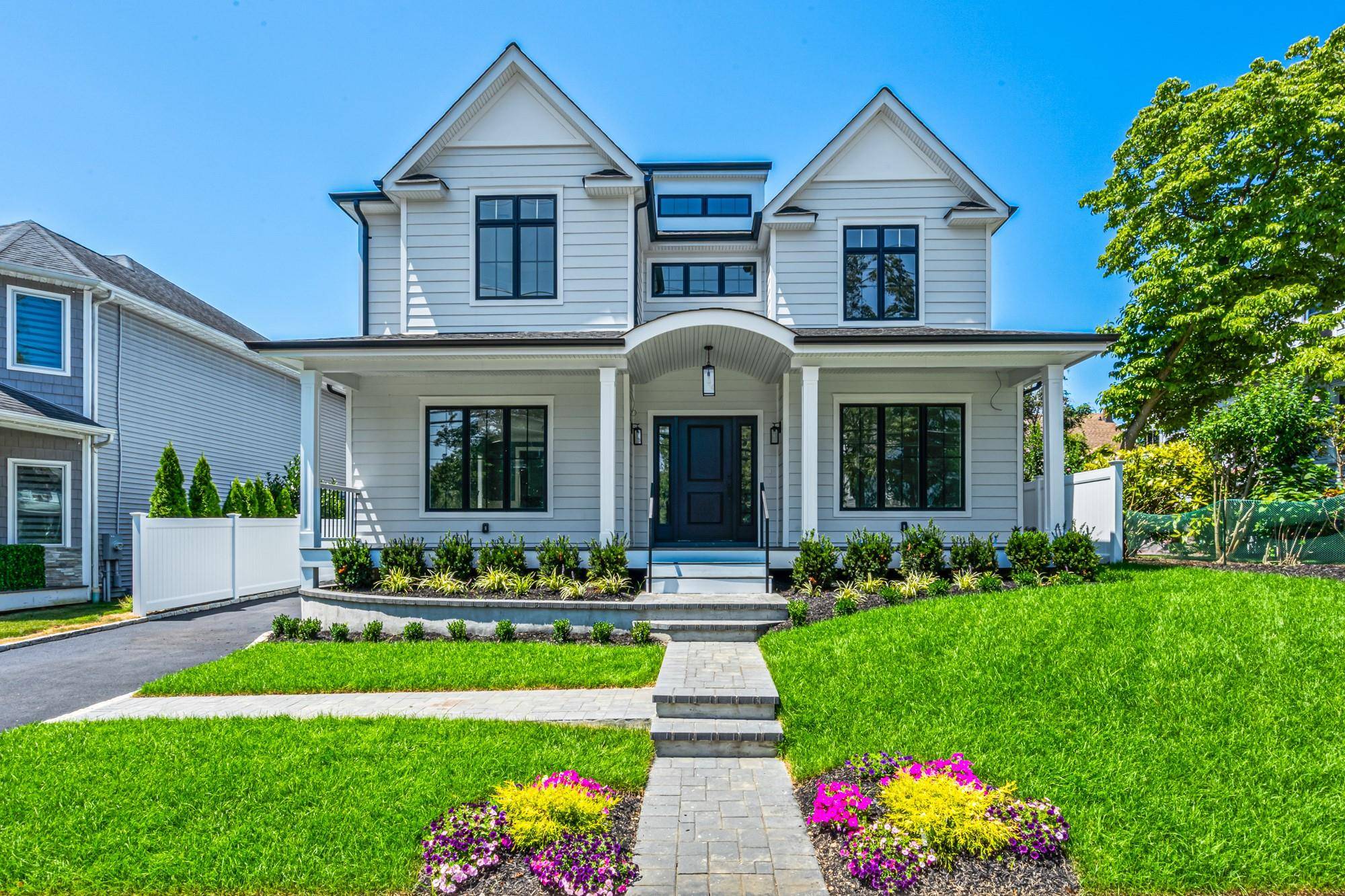 Stunning New Construction Center Hall Colonial This beautifully designed home offers 3, 759 square feet of elegant living space, including a fully finished lower level, and welcomes you with a ...