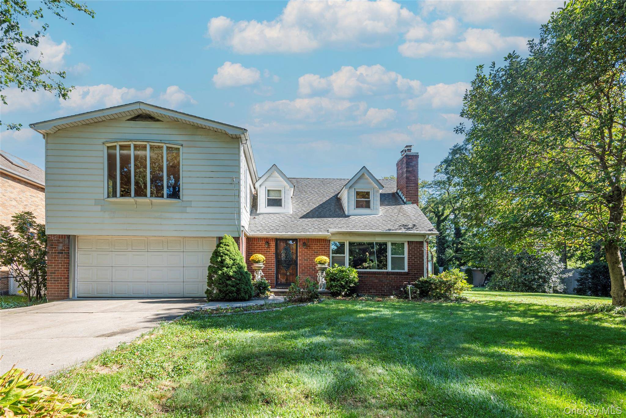 Welcome to this exceptional and spacious single family home located in the heart of Douglaston, Queens, offering rare country style living on a quiet, tree lined private road.