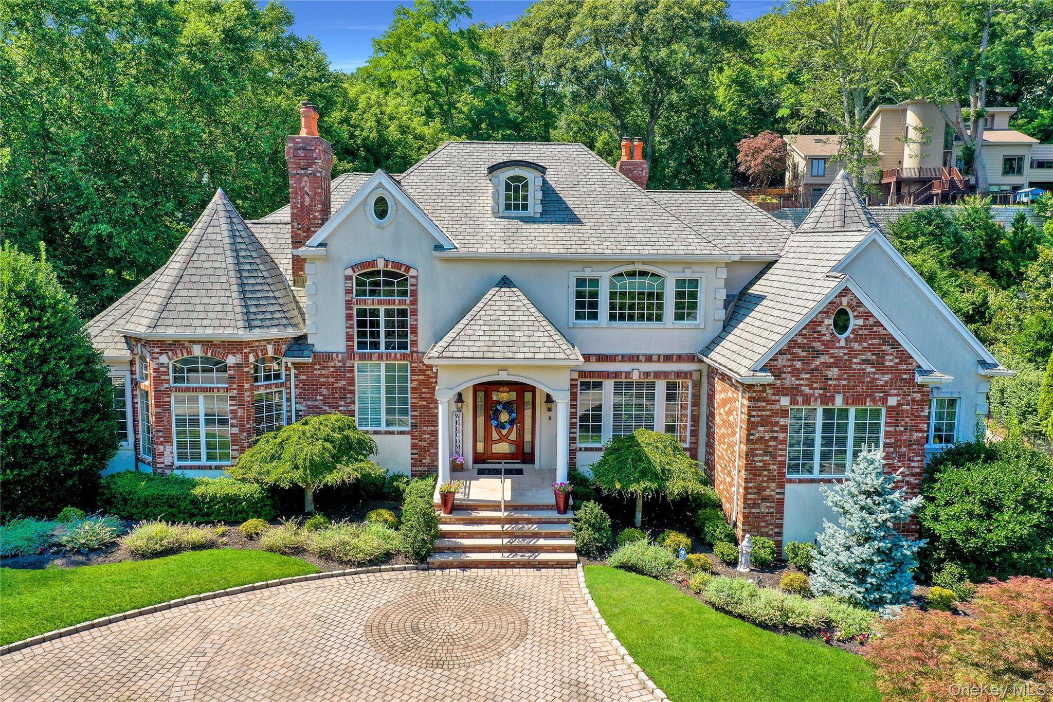 A Home that dreams are made of, your own turnkey, gem of a retreat by Mount Sinai Harbor !