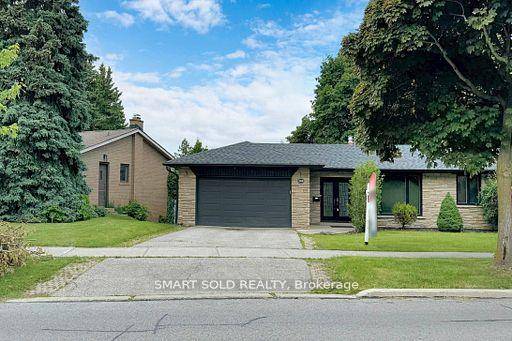 Newly renovated, open concept, spacious bungalow on a wide 212 x 117 ft lot.