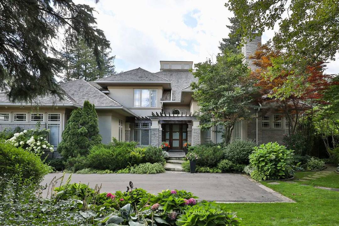 Nestled on one of the Bridle Path's most private and coveted streets, this magnificent south facing estate on Country Lane epitomizes refined luxury and timeless elegance.