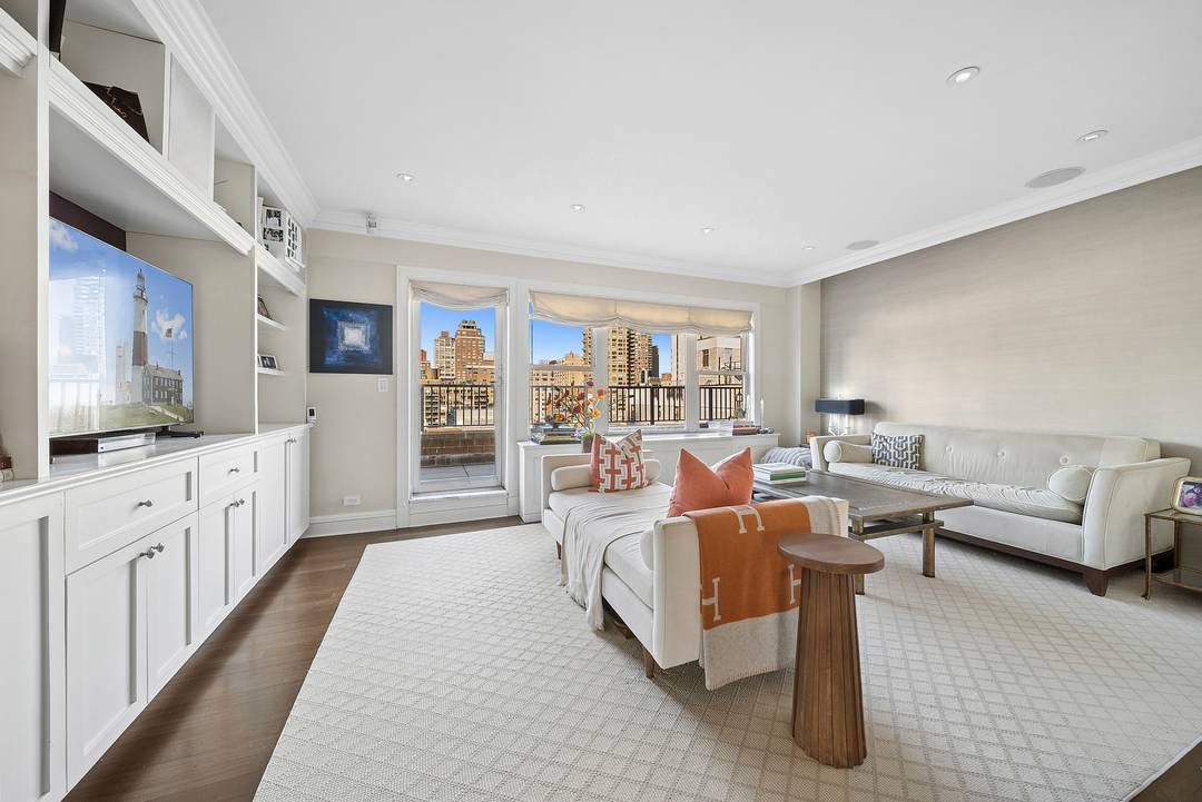 Terrace Lover's Dream on the Upper East Side Perched atop the penthouse level of a full service Upper East Side cooperative, this exceptional three bedroom, three bathroom residence is wrapped ...